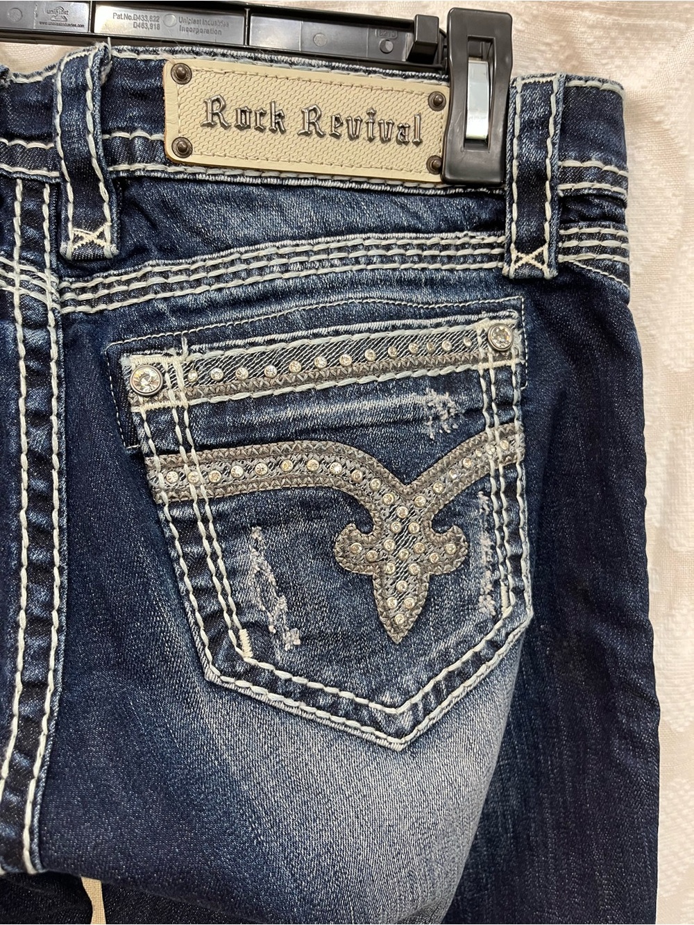 Rock Revival Dark Blue Denim Jeans with Rhinestone Fleur-de-Lis